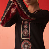 Black Women’s Woollen Kurti with Inserts and Zari Work