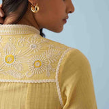 Yellow Embroidered Thigh Length Crinkled Kurti - Lakshita