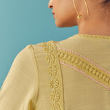 Solid Yellow Textured Kurta Set with Schiffli & Lace Work - Lakshita