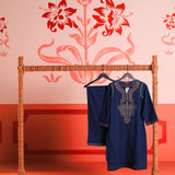A hanging Khurshid Navy Blue Embroidered Cotton Linen Designer Kurta Set