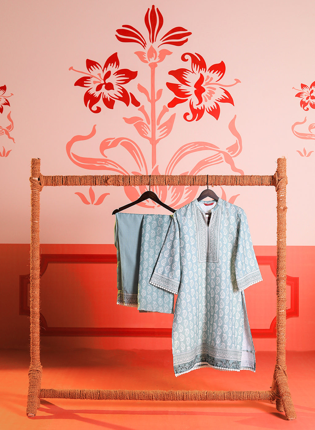 Fiona Aqua Printed Cotton Linen Set with Dupatta is hanging in a creative set