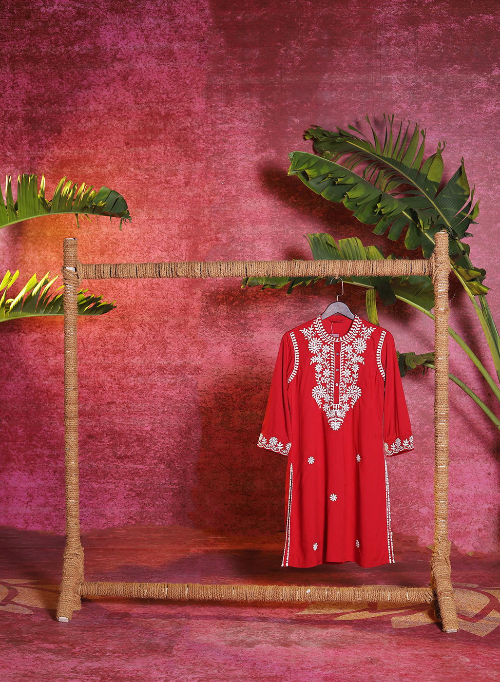 Front view of a hanging Saadgi Red Embroidered Cotton Linen Tunic