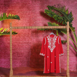 Front view of a hanging Saadgi Red Embroidered Cotton Linen Tunic