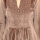 The intricate neckline work of Qainaat Beige Embroidered Velvet Top for Women