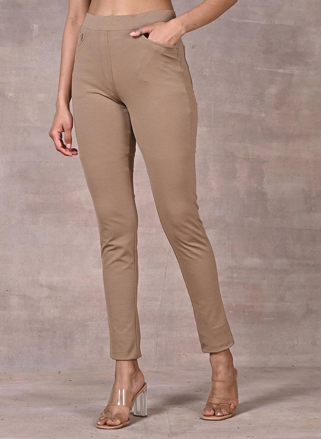 Beige Solid Elastic Jegging with Pocket and Rivets Detailing - Lakshita