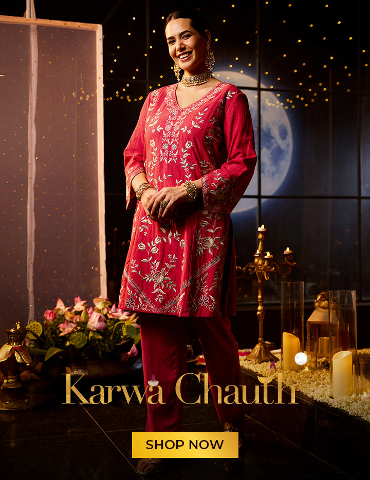 Model wearing a pink-coloured kurta set, exclusive for Karwa Chauth