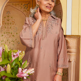 An Elegant Elderly Woman With Silver Hair in A Niya Oak Brown Embroidered Cotton Linen Slub Long Top