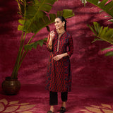 Taara Maroon Printed Viscose Silk Indo-Western Dress paired with black pants and black loafers