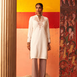 White Embroidered Woollen Kurti for Women with Mirror Work