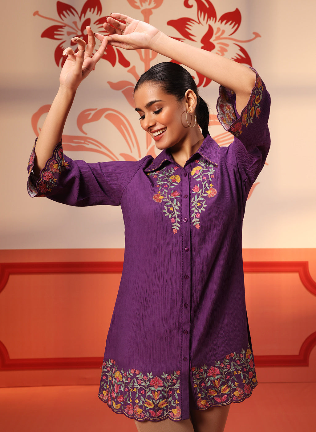 Woman smiling in Malika Purple Embroidered Crinkled Crepe Long Shirt