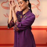 Woman displaying the sleeves of a Malika Purple Embroidered Crinkled Crepe Long Shirt