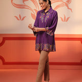 Malika Purple Embroidered Crinkled Crepe Long Shirt paired with beige pants