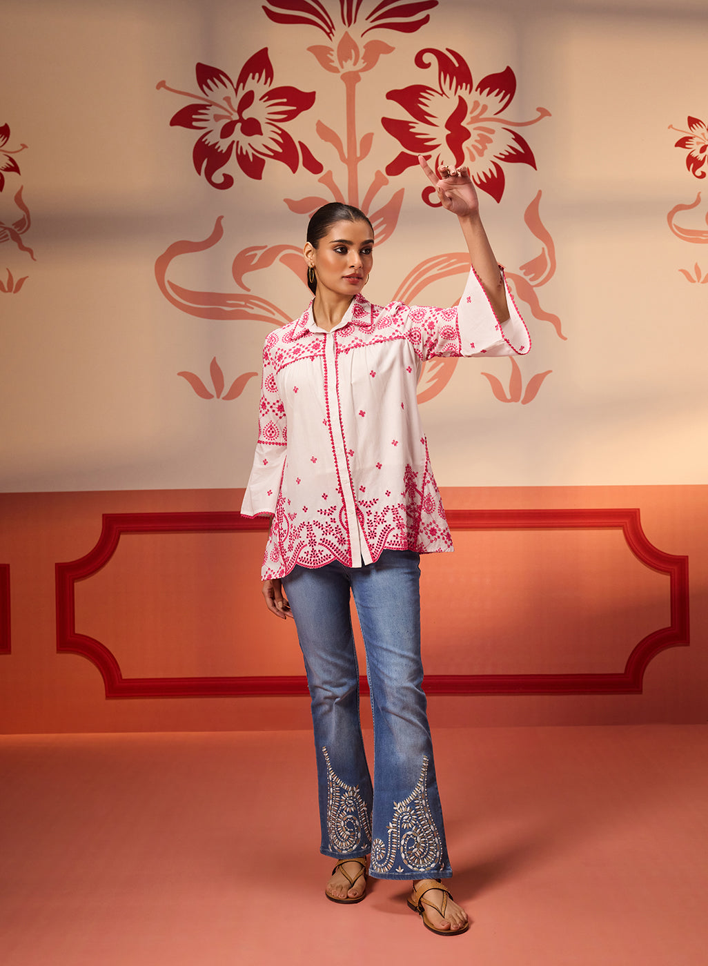 Woman wearing Masakali Ivory with Fuchsia Pink Embroidered Schiffli Shirt with embroidered denim pants