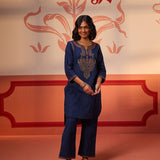 A woman wearing Khurshid Navy Blue Embroidered Cotton Linen Designer Kurta Set