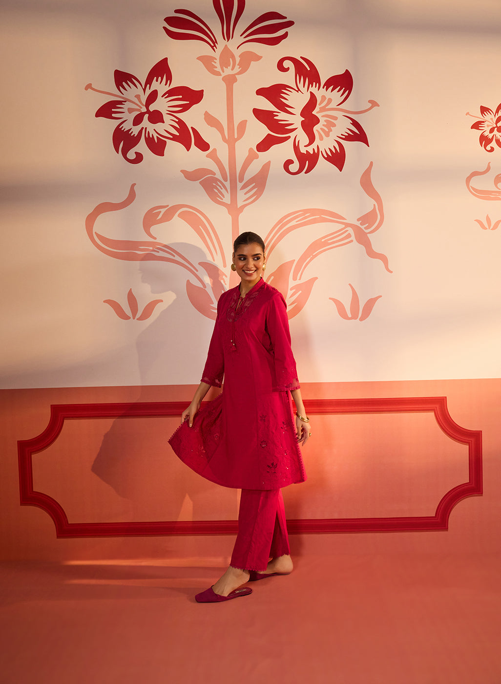 Woman swirling in her Zara Fuchsia Cotton Linen Embroidered Kurta Set