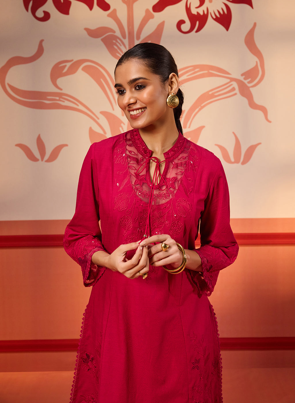 Woman smiling in a red Zara Fuchsia Cotton Linen Embroidered Kurta