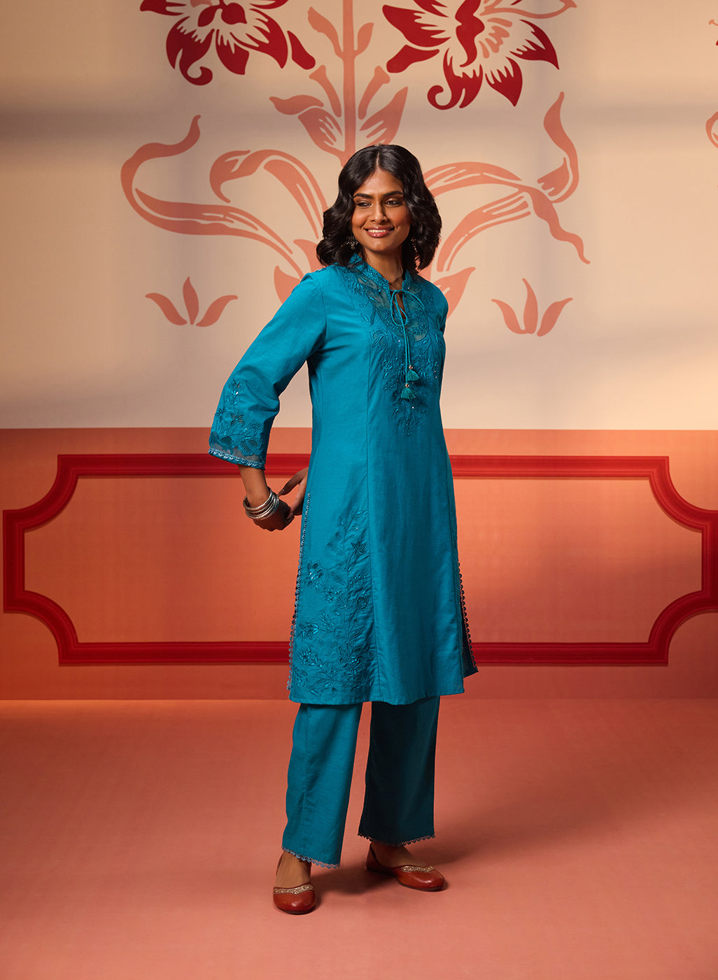 Right side view of Zara Teal Cotton Linen Embroidered Kurta Set