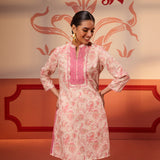 Woman smiling in a Roshna Coral Printed Cotton Linen Kurta Set