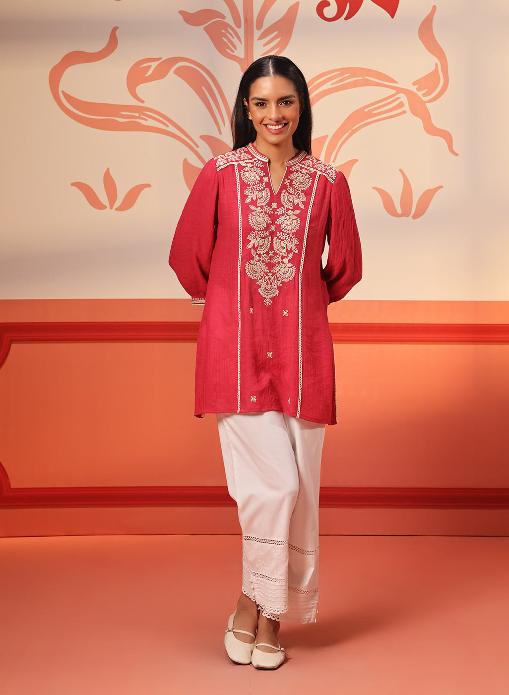 Woman flaunting Kashaf Crimson Pink Embroidered Crinkled Crepe Long Top