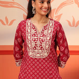Front view of a hanging Kyra Cherry Red Printed Cotton Designer Kurta