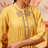 Close-up view of Rumi Bright Yellow Printed Tunic