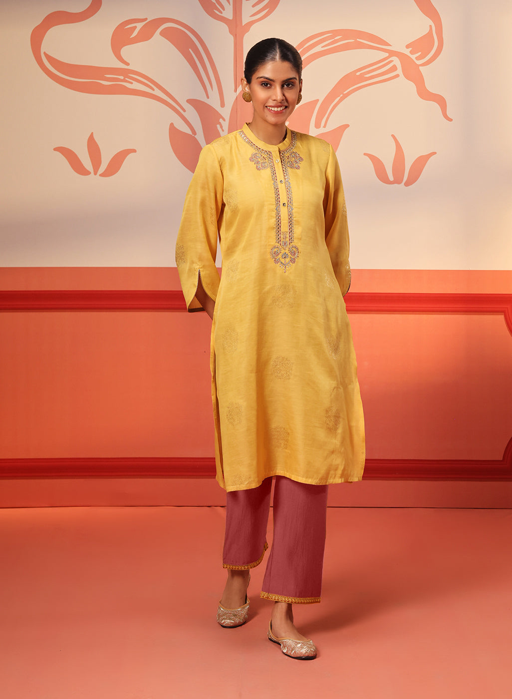 Woman smiling in Rumi Bright Yellow Printed Tunic Set