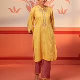 Woman smiling in Rumi Bright Yellow Printed Tunic Set