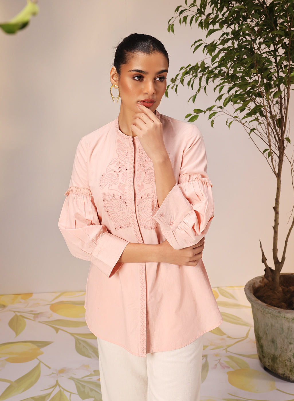 Woman posing in a Nudrat Light Pink Embroidered Cotton Long Shirt