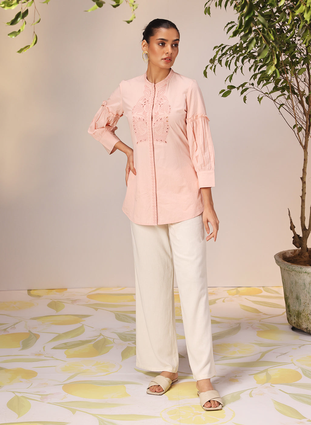 Nudrat Light Pink Embroidered Cotton Long Shirt paired with white pants