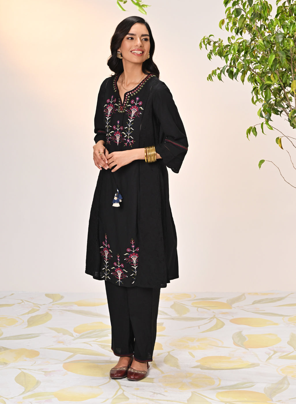 Left side view of Harleen Ivory with Black Embroidered Cotton Linen Kurta Set