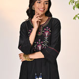 Woman smiling in Harleen Ivory with Black Embroidered Cotton Linen Kurta