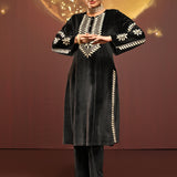 Woman making a dance move in Mumtaaz Grey Embroidered Velvet Co-ord Set