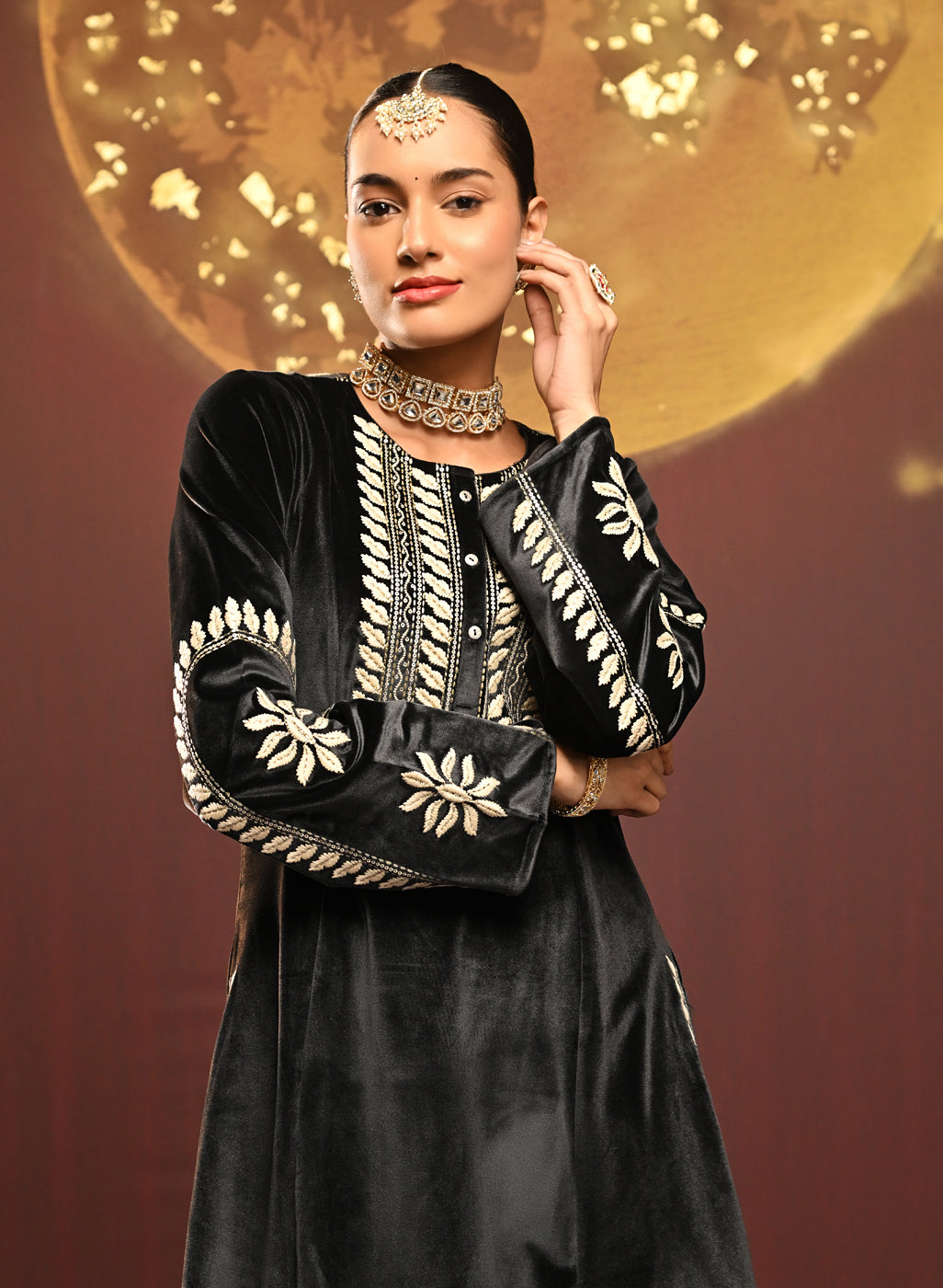 Woman showing the top of Mumtaaz Grey Embroidered Velvet Co-ord Set