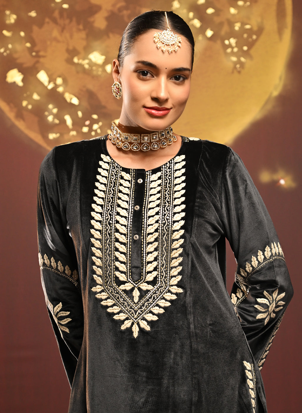 Woman showing the top of Mumtaaz Grey Embroidered Velvet Co-ord Set