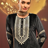 Woman showing the top of Mumtaaz Grey Embroidered Velvet Co-ord Set