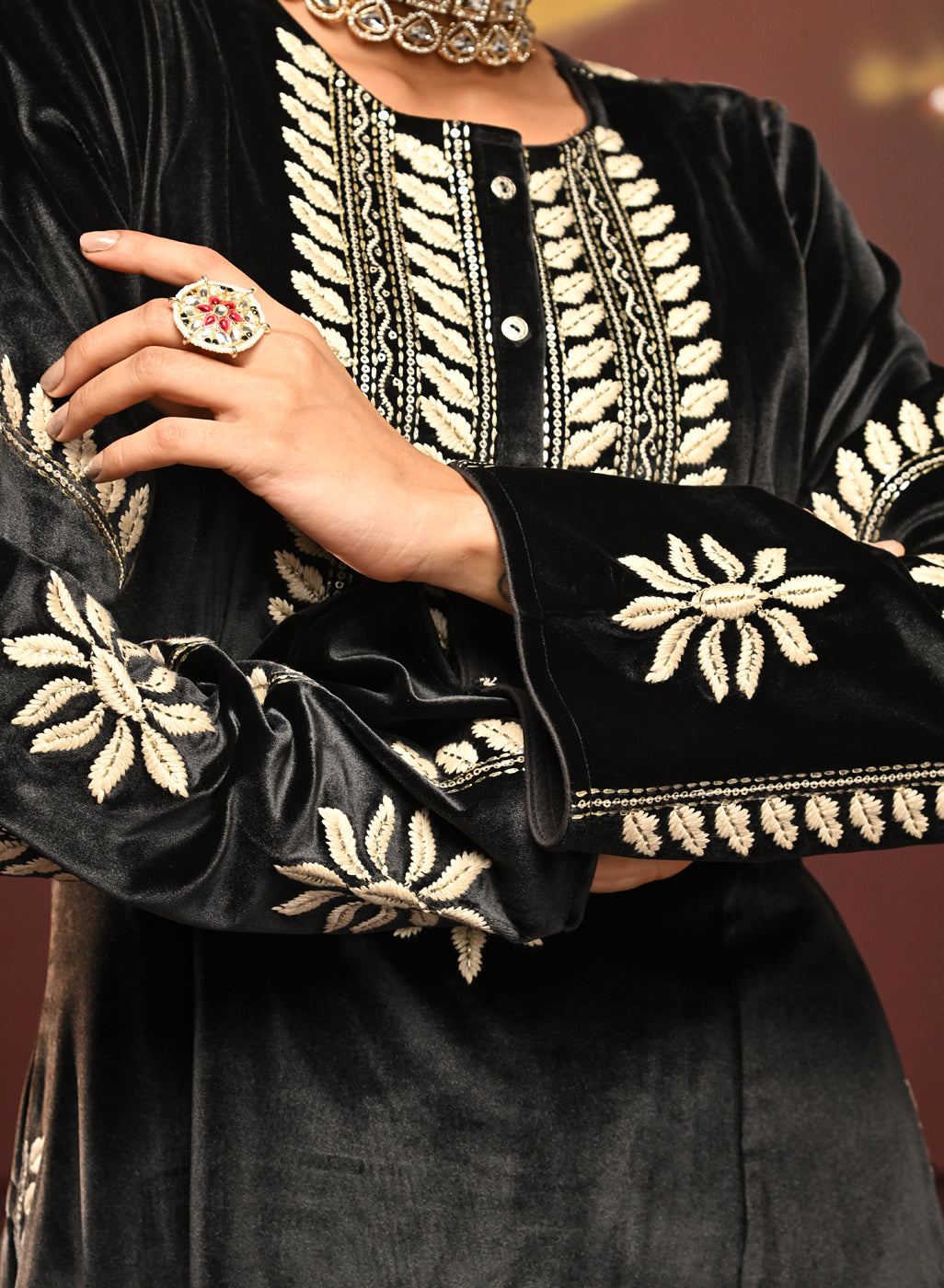 The detail neckline and sleeve work of the Mumtaaz Grey Embroidered Velvet Co-ord Set for Women