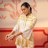 Woman showing the sleeves of Masakali Ivory with a Yellow Embroidered Schiffli Shirt