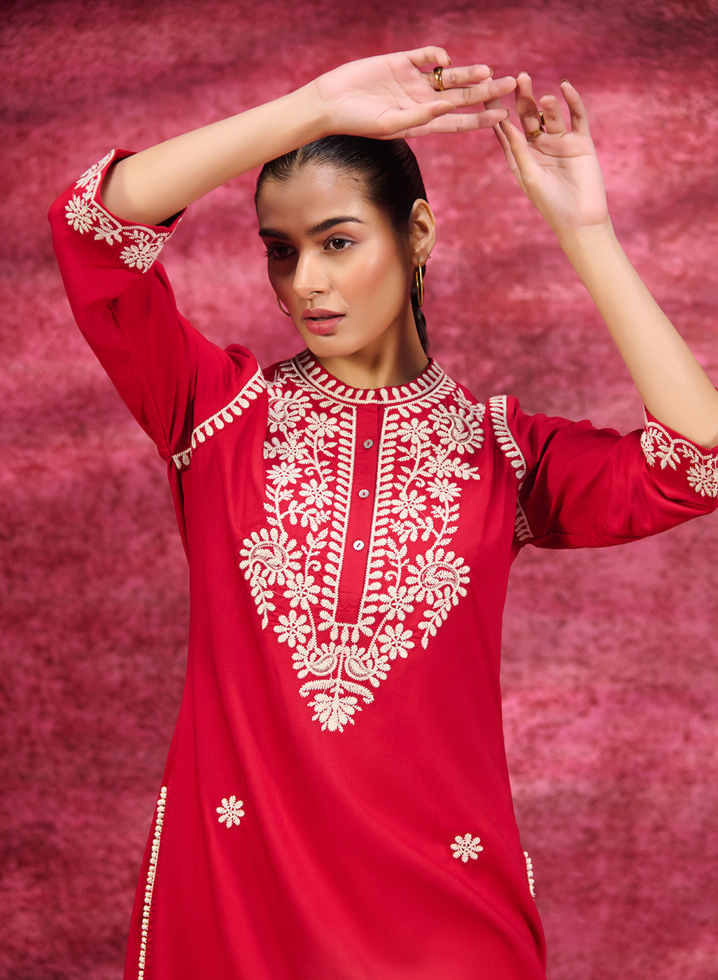 Close-up front view of a Saadgi Red Embroidered Cotton Linen Tunic