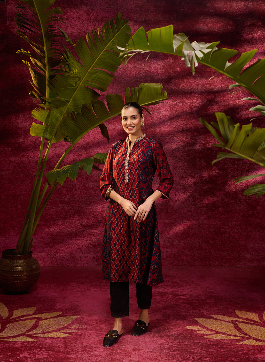 A woman wearing Taara Maroon Printed Viscose Silk Indo-Western Dress