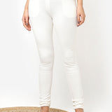 Ivory Solid Elastic Jegging with Pocket and Rivets Detailing