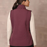 Maroon Solid Sleeveless Quilted Jacket With Rivets Detail & Curved Hem - Lakshita