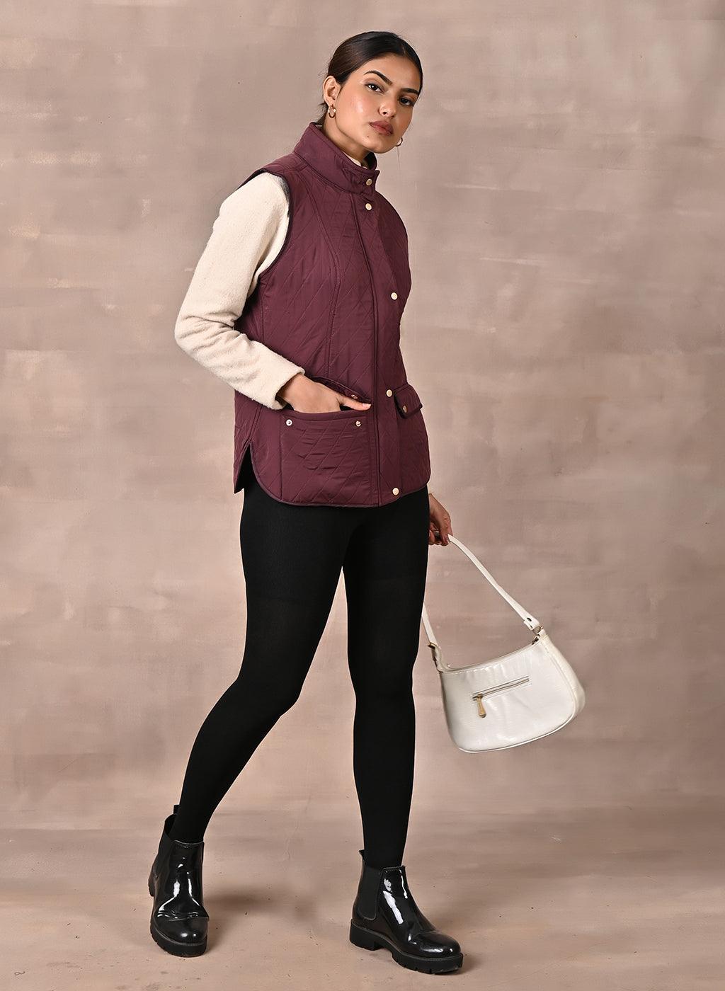 Maroon Solid Sleeveless Quilted Jacket With Rivets Detail & Curved Hem - Lakshita