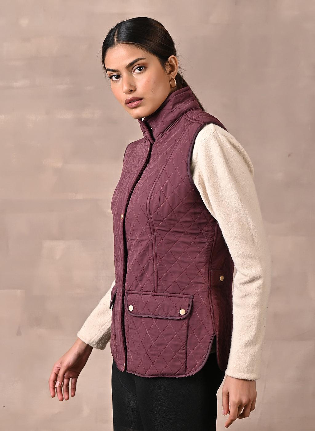 Maroon Solid Sleeveless Quilted Jacket With Rivets Detail & Curved Hem - Lakshita