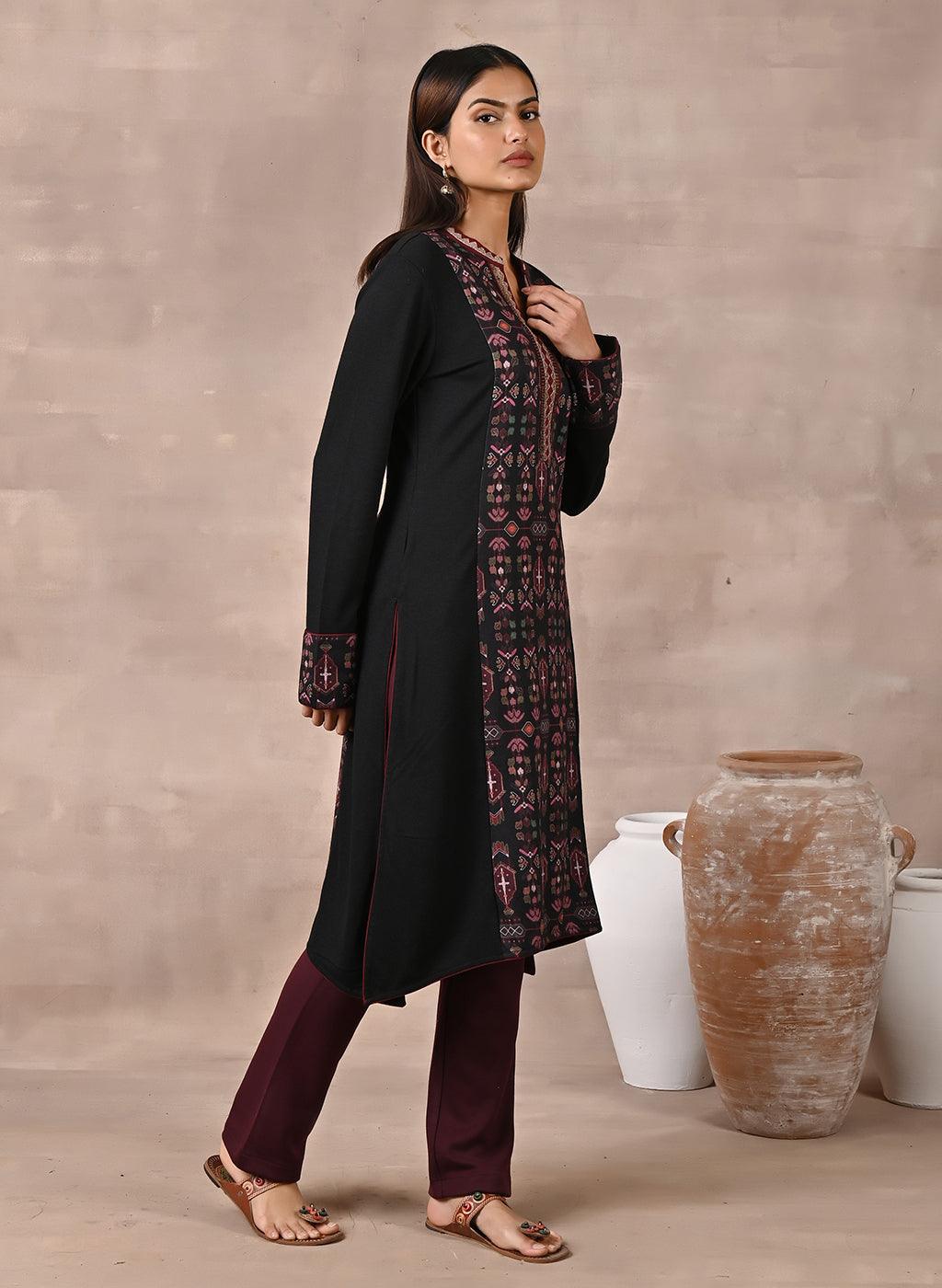 Black Solid Kurta with Tribal Embroidery and Curved Hem - Lakshita