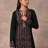 Black Solid Kurta with Tribal Embroidery and Curved Hem - Lakshita