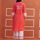 Peach Embroidered Kurta with Asymmetric Hem and Schiffili Detailing on the Sleeves - Lakshita